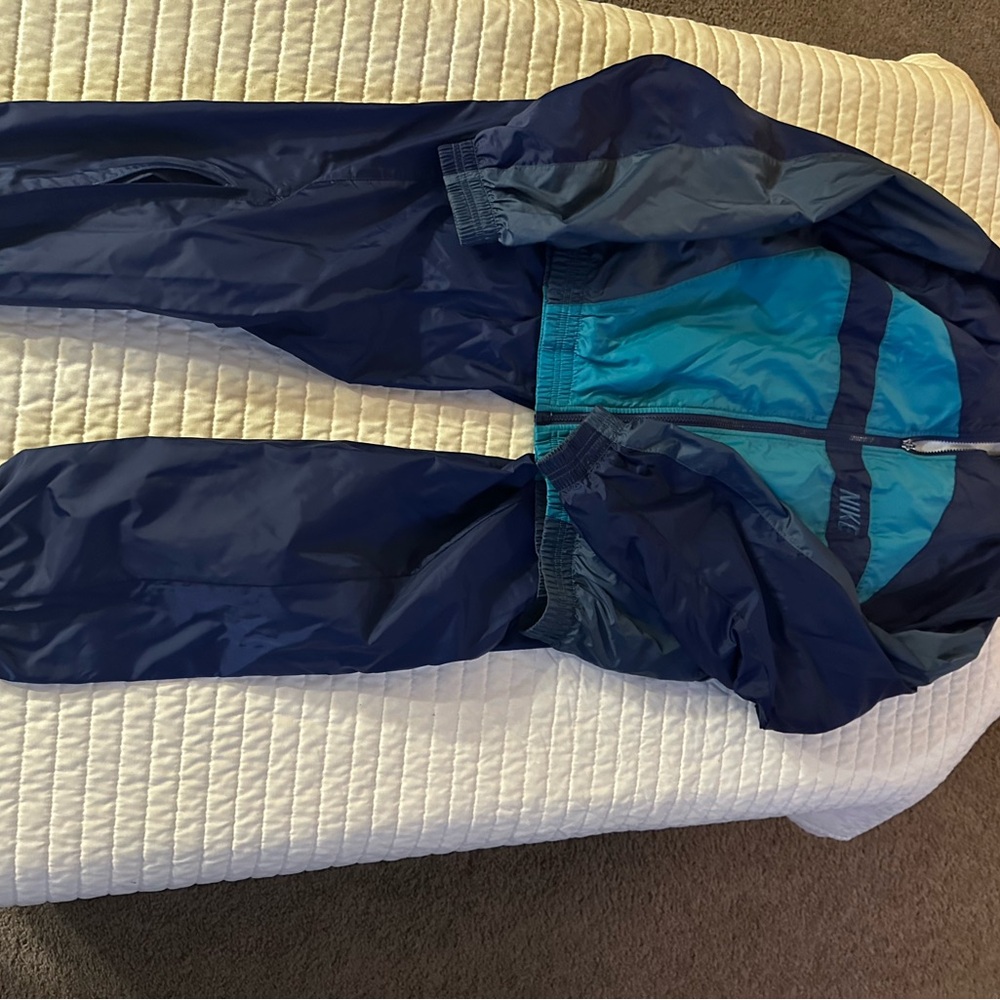 Vintage 90’s Nike Teal and Navy Jacket and pants. Wind suit